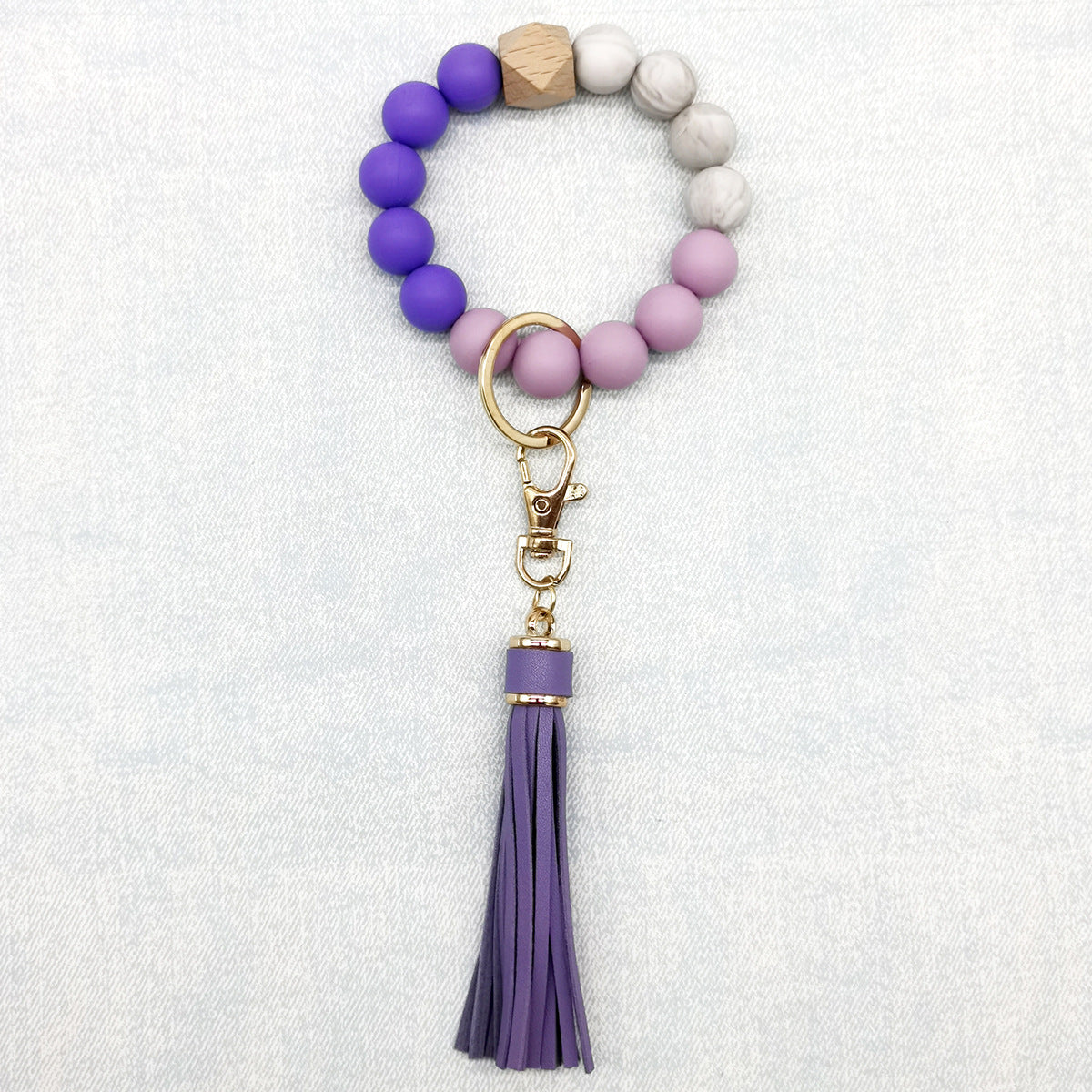 Pulsera de cuentas de silicona con borlas al por mayor llavero de muñeca